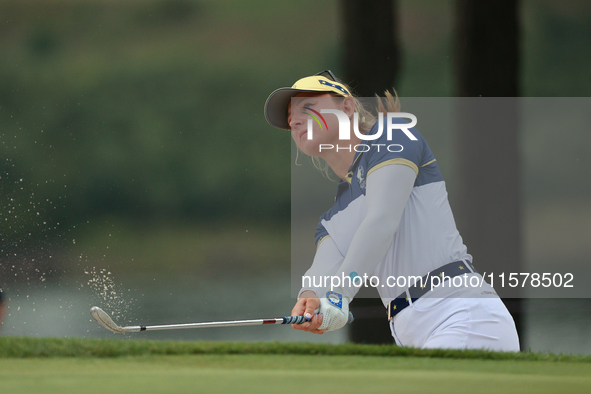 GAINESVILLE, VIRGINIA - SEPTEMBER 15: Emily Kristine Pedersen of Team Europe hits out of the bunker toward the eighth green during single ma...