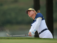 GAINESVILLE, VIRGINIA - SEPTEMBER 15: Emily Kristine Pedersen of Team Europe hits out of the bunker toward the eighth green during single ma...