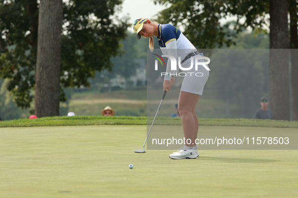 GAINESVILLE, VIRGINIA - SEPTEMBER 15: Emily Kristine Pedersen of Team Europe follows her putt on the eighth green during single matches on D...