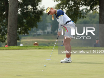 GAINESVILLE, VIRGINIA - SEPTEMBER 15: Emily Kristine Pedersen of Team Europe follows her putt on the eighth green during single matches on D...