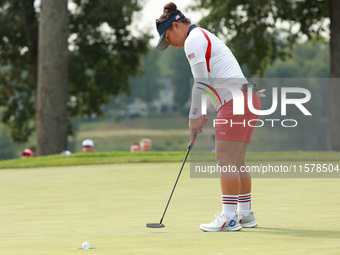 GAINESVILLE, VIRGINIA - SEPTEMBER 15: Megan Khang of the United States follows her putt on the eigh green during single matches on Day Three...