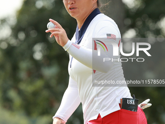 GAINESVILLE, VIRGINIA - SEPTEMBER 15: Megan Khang of the United States acknowledges the crowd on the eighth green during single matches on D...