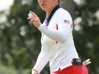 GAINESVILLE, VIRGINIA - SEPTEMBER 15: Megan Khang of the United States acknowledges the crowd on the eighth green during single matches on D...