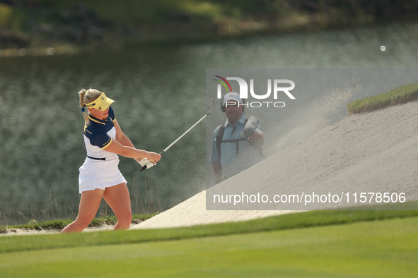 GAINESVILLE, VIRGINIA - SEPTEMBER 15: Charley Hull of Team Europe hits out of the bunker on the tenth green during single matches on Day Thr...