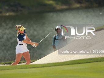 GAINESVILLE, VIRGINIA - SEPTEMBER 15: Charley Hull of Team Europe hits out of the bunker on the tenth green during single matches on Day Thr...