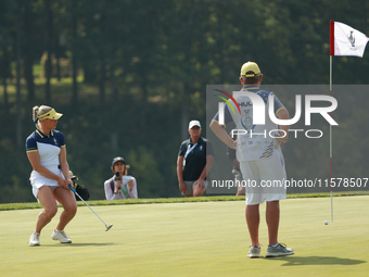 GAINESVILLE, VIRGINIA - SEPTEMBER 15: Charley Hull of Team Europe reacts to her putt on the tenth green during single matches on Day Three o...