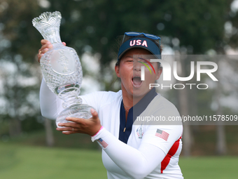 GAINESVILLE, VIRGINIA - SEPTEMBER 15: Megan Khang of the United States poses with the trophy on the 18th green at the conclusion of the Solh...