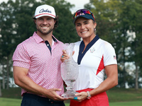 GAINESVILLE, VIRGINIA - SEPTEMBER 15: Lexi Thompson of the United States poses with her significant other, holding the trophy on the 18th gr...