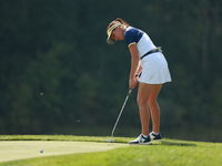 GAINESVILLE, VIRGINIA - SEPTEMBER 15: Georgia Hall of Team Europe follows her putt on the tenth green during single matches on Day Three of...