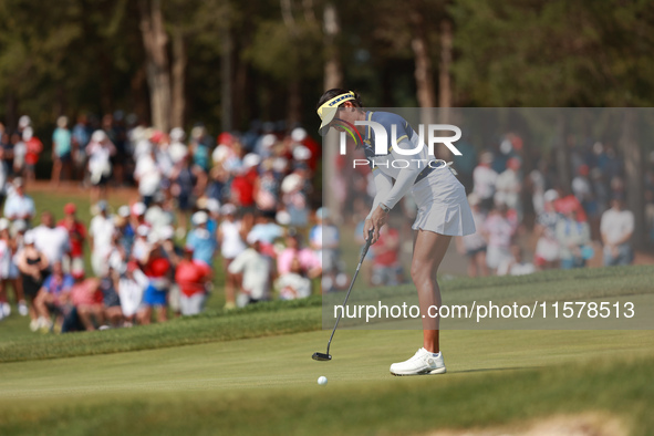 GAINESVILLE, VIRGINIA - SEPTEMBER 15: Celine Boutier of Team Europe follows her putt on the 16th green during single matches on Day Three of...