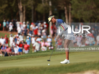 GAINESVILLE, VIRGINIA - SEPTEMBER 15: Celine Boutier of Team Europe follows her putt on the 16th green during single matches on Day Three of...