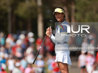 GAINESVILLE, VIRGINIA - SEPTEMBER 15: Celine Boutier of Team Europe reacts to her putt on the 16th green during single matches on Day Three...