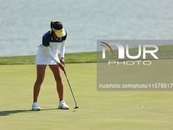 GAINESVILLE, VIRGINIA - SEPTEMBER 15: Celine Boutier of Team Europe follows her putt on the 18th green during single matches on Day Three of...