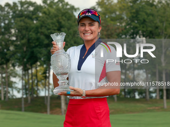 GAINESVILLE, VIRGINIA - SEPTEMBER 15: Lexi Thompson of the United States poses with the trophy on the 18th green at the conclusion of the So...