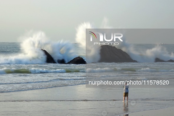 Waves surge due to the external circulation of Typhoon Bebika along the west coast of Qingdao, China, on September 16, 2024. 