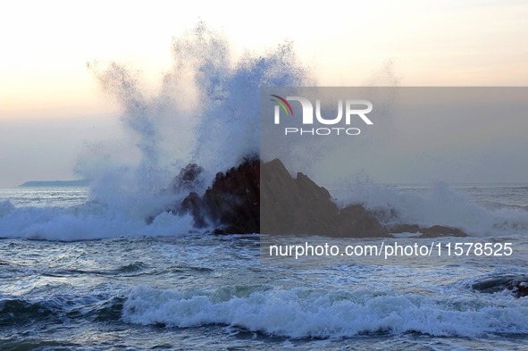 Waves surge due to the external circulation of Typhoon Bebika along the west coast of Qingdao, China, on September 16, 2024. 