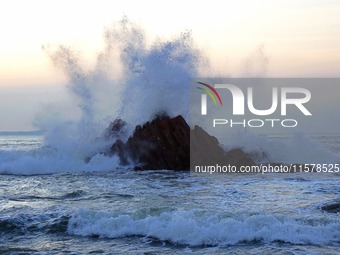 Waves surge due to the external circulation of Typhoon Bebika along the west coast of Qingdao, China, on September 16, 2024. (