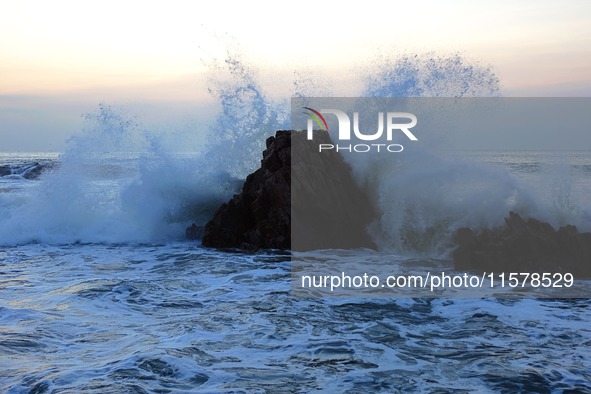 Waves surge due to the external circulation of Typhoon Bebika along the west coast of Qingdao, China, on September 16, 2024. 