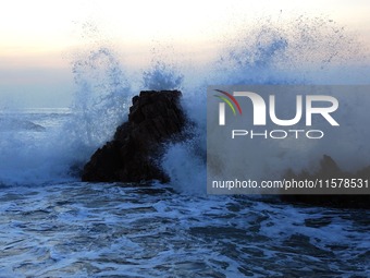 Waves surge due to the external circulation of Typhoon Bebika along the west coast of Qingdao, China, on September 16, 2024. (