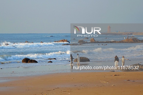 Waves surge due to the external circulation of Typhoon Bebika along the west coast of Qingdao, China, on September 16, 2024. 