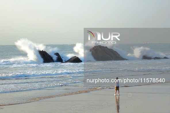 Waves surge due to the external circulation of Typhoon Bebika along the west coast of Qingdao, China, on September 16, 2024. 