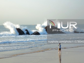 Waves surge due to the external circulation of Typhoon Bebika along the west coast of Qingdao, China, on September 16, 2024. (