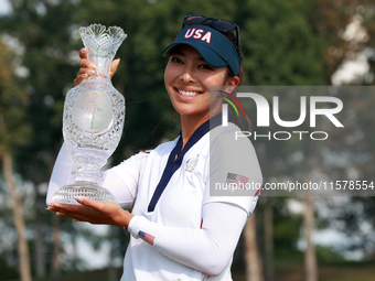 GAINESVILLE, VIRGINIA - SEPTEMBER 15: Alison Lee of the United States poses with the trophy on the 18th green at the conclusion of the Solhe...