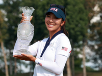 GAINESVILLE, VIRGINIA - SEPTEMBER 15: Alison Lee of the United States poses with the trophy on the 18th green at the conclusion of the Solhe...