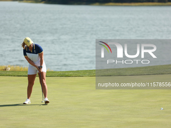 GAINESVILLE, VIRGINIA - SEPTEMBER 15: Maja Stark of Team Europe follows her putt on the 18th green during single matches on Day Three of the...