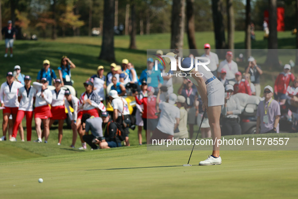 GAINESVILLE, VIRGINIA - SEPTEMBER 15: Albane Valenzuela of Team Europe reacts to her putt on the 18th green during single matches on Day Thr...