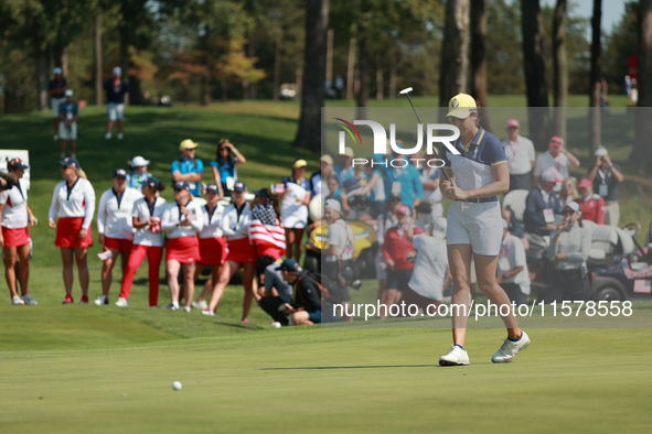 GAINESVILLE, VIRGINIA - SEPTEMBER 15: Albane Valenzuela of Team Europe reacts to her putt on the 18th green during single matches on Day Thr...