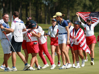 GAINESVILLE, VIRGINIA - SEPTEMBER 15: Team USA players celebrate after winning the Solheim Cup at Robert Trent Jones Golf Club on Sunday, Se...