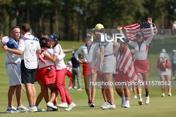 GAINESVILLE, VIRGINIA - SEPTEMBER 15: Team USA players celebrate after winning the Solheim Cup at Robert Trent Jones Golf Club on Sunday, Se...