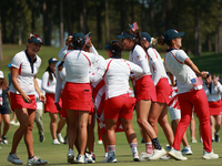 GAINESVILLE, VIRGINIA - SEPTEMBER 15: Team USA players celebrate after winning the Solheim Cup at Robert Trent Jones Golf Club on Sunday, Se...