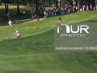 GAINESVILLE, VIRGINIA - SEPTEMBER 15: Lexi Thompson of the United States plays her second shot out of the bunker on the 15th hole during sin...