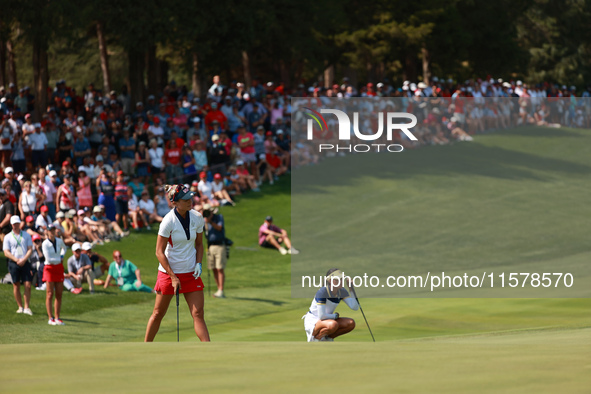 GAINESVILLE, VIRGINIA - SEPTEMBER 15: Lexi Thompson of the United States reacts to her putt on the 15th green during single matches on Day T...