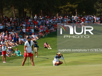 GAINESVILLE, VIRGINIA - SEPTEMBER 15: Lexi Thompson of the United States reacts to her putt on the 15th green during single matches on Day T...