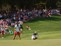 GAINESVILLE, VIRGINIA - SEPTEMBER 15: Lexi Thompson of the United States reacts to her putt on the 15th green during single matches on Day T...