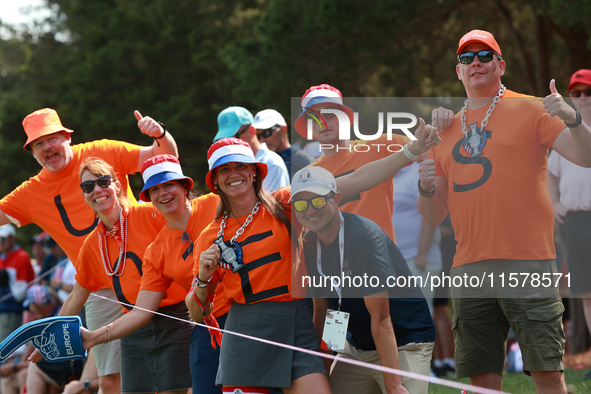 GAINESVILLE, VIRGINIA - SEPTEMBER 15: Dutch fans cheer during single matches on Day Three of the Solheim Cup at Robert Trent Jones Golf Club...