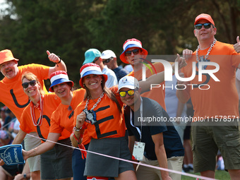 GAINESVILLE, VIRGINIA - SEPTEMBER 15: Dutch fans cheer during single matches on Day Three of the Solheim Cup at Robert Trent Jones Golf Club...