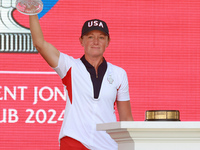 GAINESVILLE, VIRGINIA - SEPTEMBER 15: Captain Stacy Lewis of the United States raises the trophy during the awards ceremony on the Great Law...