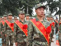 New recruits line up at the militia training base in Yongnian district of Handan, China, on September 14, 2024. (