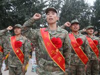 New recruits take a solemn oath at the militia training base in Yongnian district, Handan, China, on September 14, 2024. (