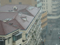 Part of the roof surface is blown by strong winds in Yangpu district, in Shanghai, China, on September 16, 2024. (