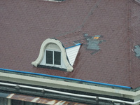 Part of the roof surface is blown by strong winds in Yangpu district, in Shanghai, China, on September 16, 2024. (