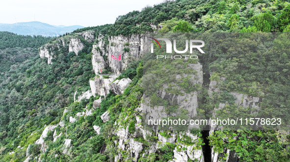 View of the Xiong 'er Mountain Rift Valley in Zaozhuang, China, on September 15, 2024. This geological formation results from a landslide ca...