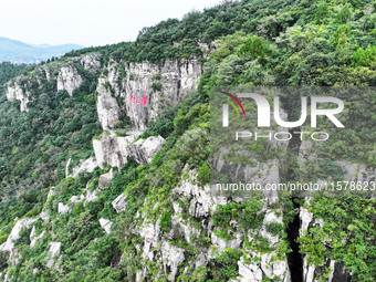 View of the Xiong 'er Mountain Rift Valley in Zaozhuang, China, on September 15, 2024. This geological formation results from a landslide ca...