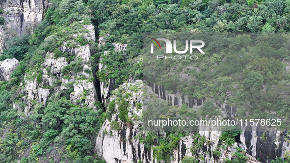 View of the Xiong 'er Mountain Rift Valley in Zaozhuang, China, on September 15, 2024. This geological formation results from a landslide ca...