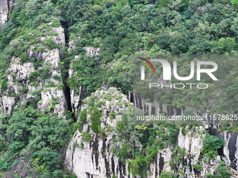 View of the Xiong 'er Mountain Rift Valley in Zaozhuang, China, on September 15, 2024. This geological formation results from a landslide ca...