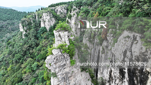 View of the Xiong 'er Mountain Rift Valley in Zaozhuang, China, on September 15, 2024. This geological formation results from a landslide ca...